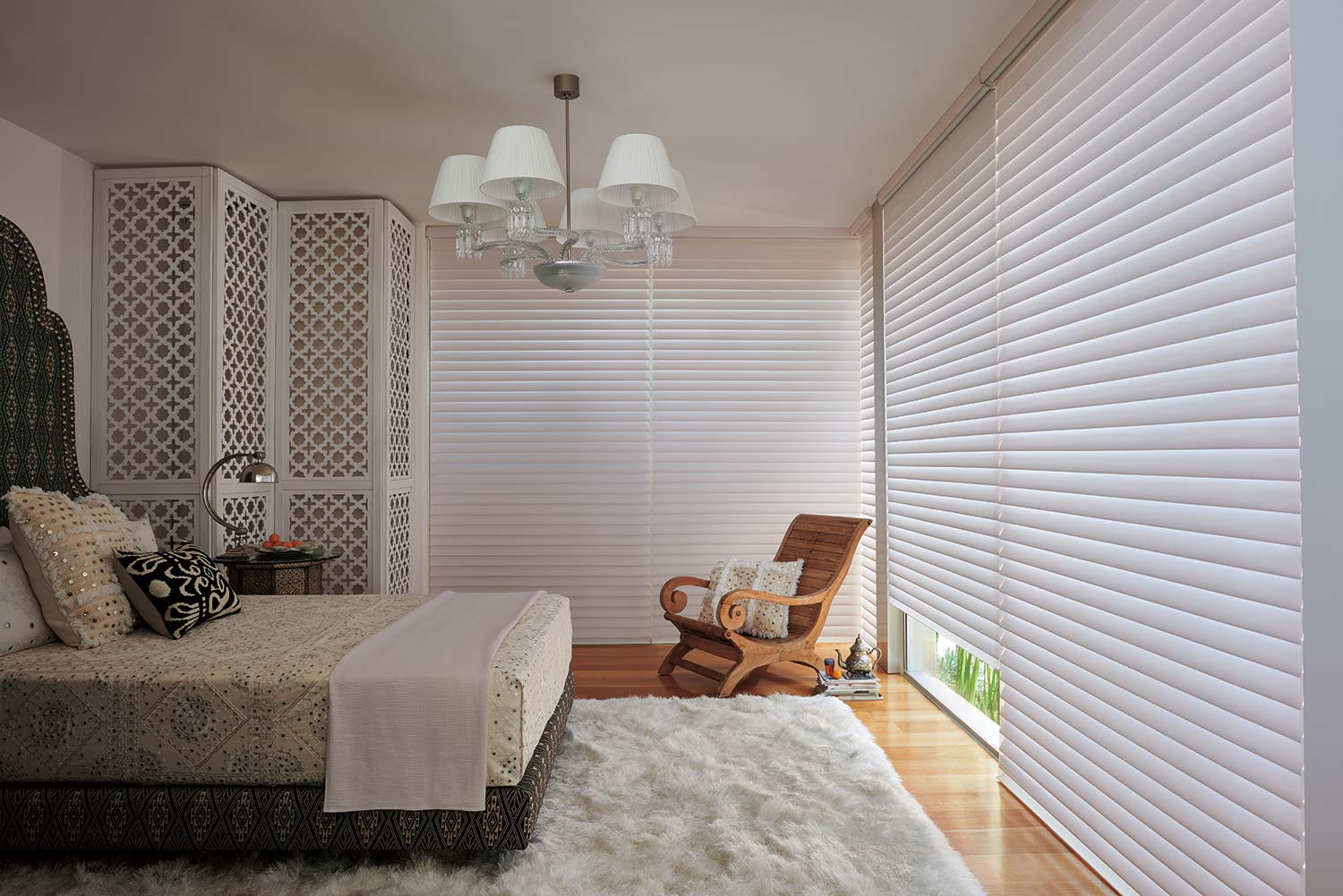a modern bedroom with sheer shades